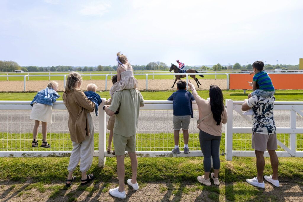 Families Watching a Horse Race